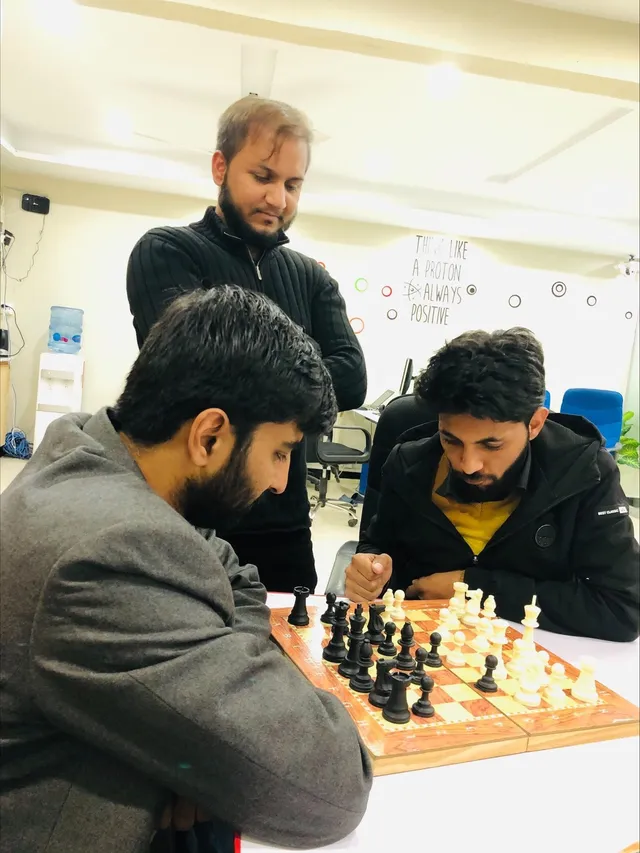 PanaceaLogics team playing chess in the office